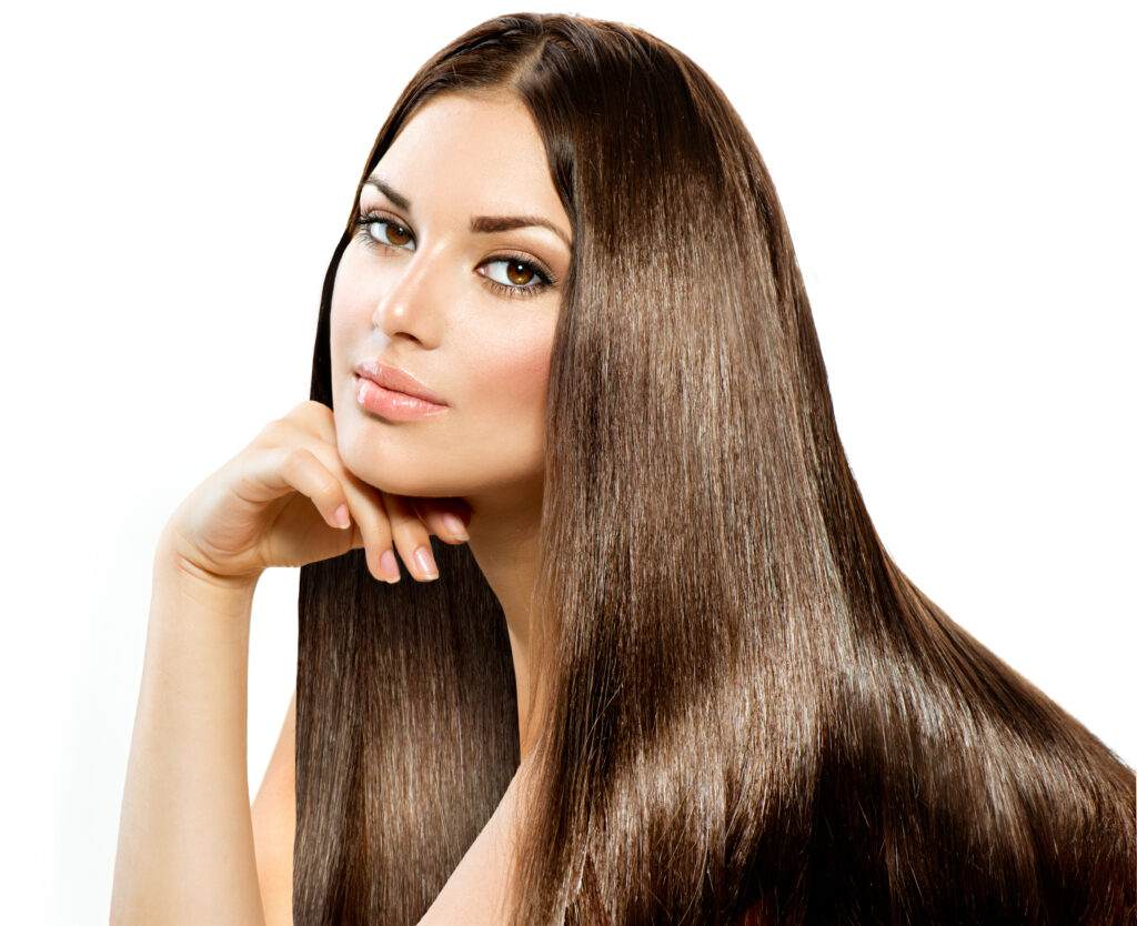 Long Straight Hair. Beautiful Brunette Girl isolated on white